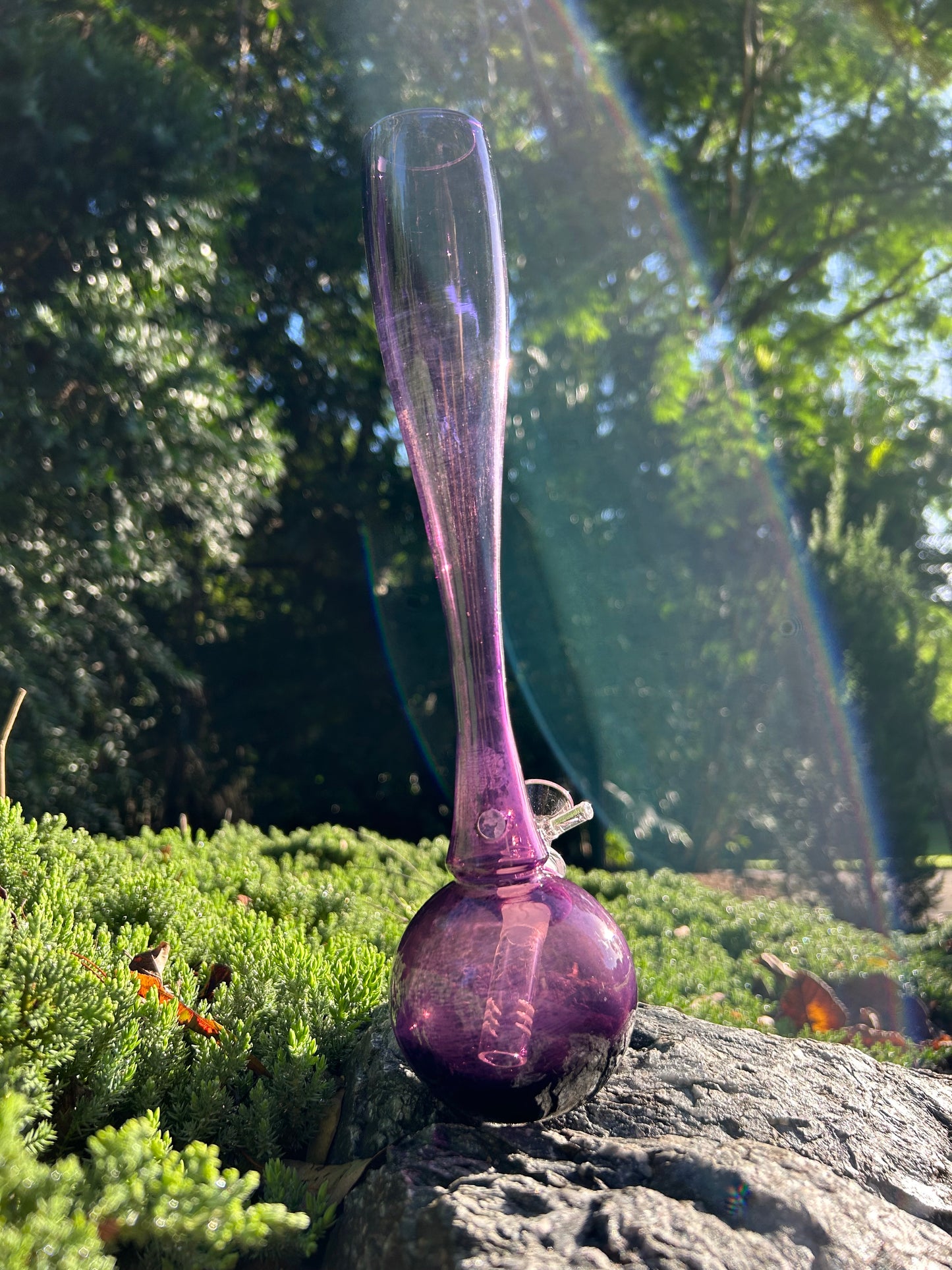 purple hand-blown glass vase, featuring a murano style