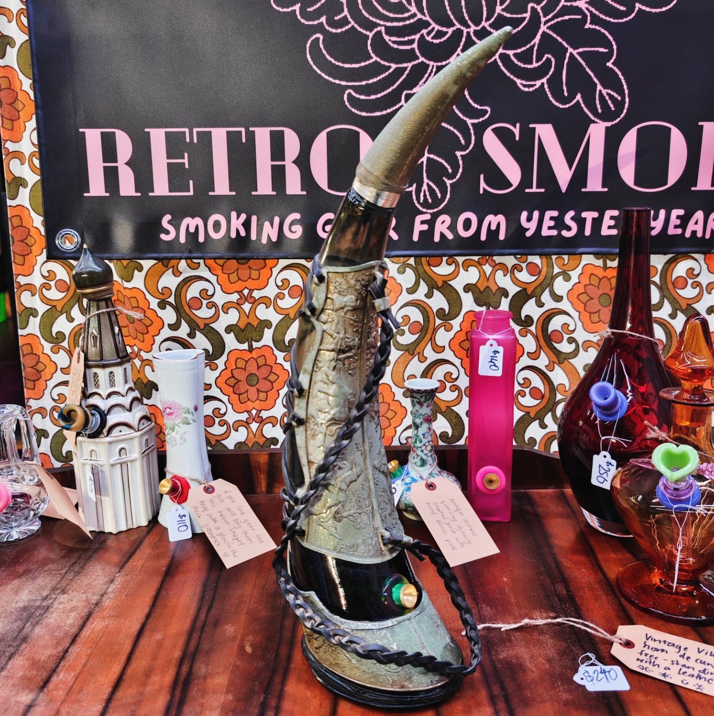 very old viking copper, green glass, and leather horn bong