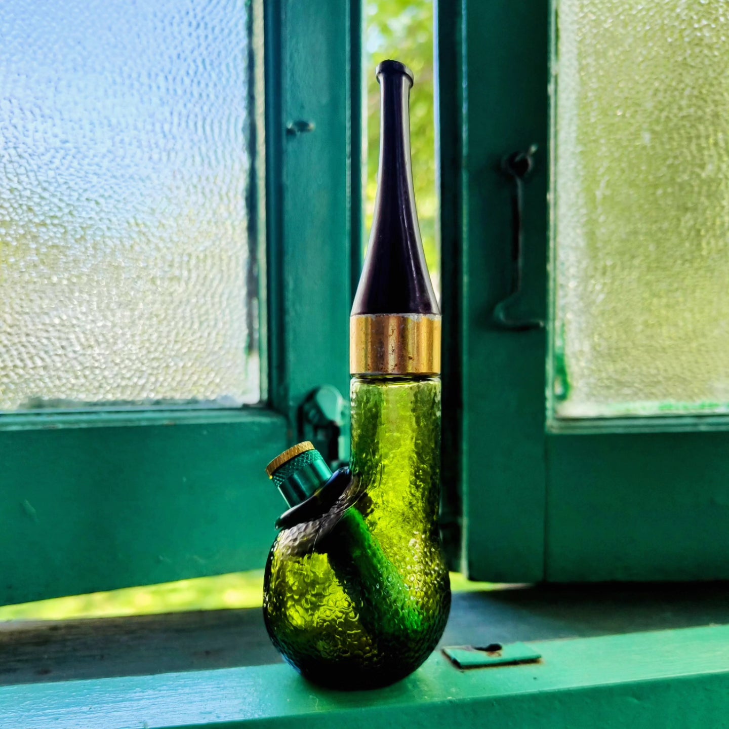 vintage avon green dimpled glass pipe shaped bong