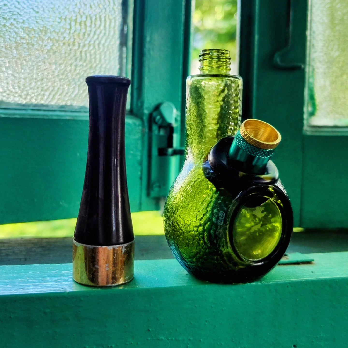 vintage avon green dimpled glass pipe shaped bong