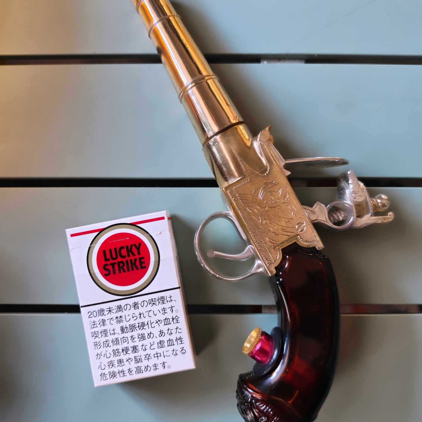 1970s avon pistol bong