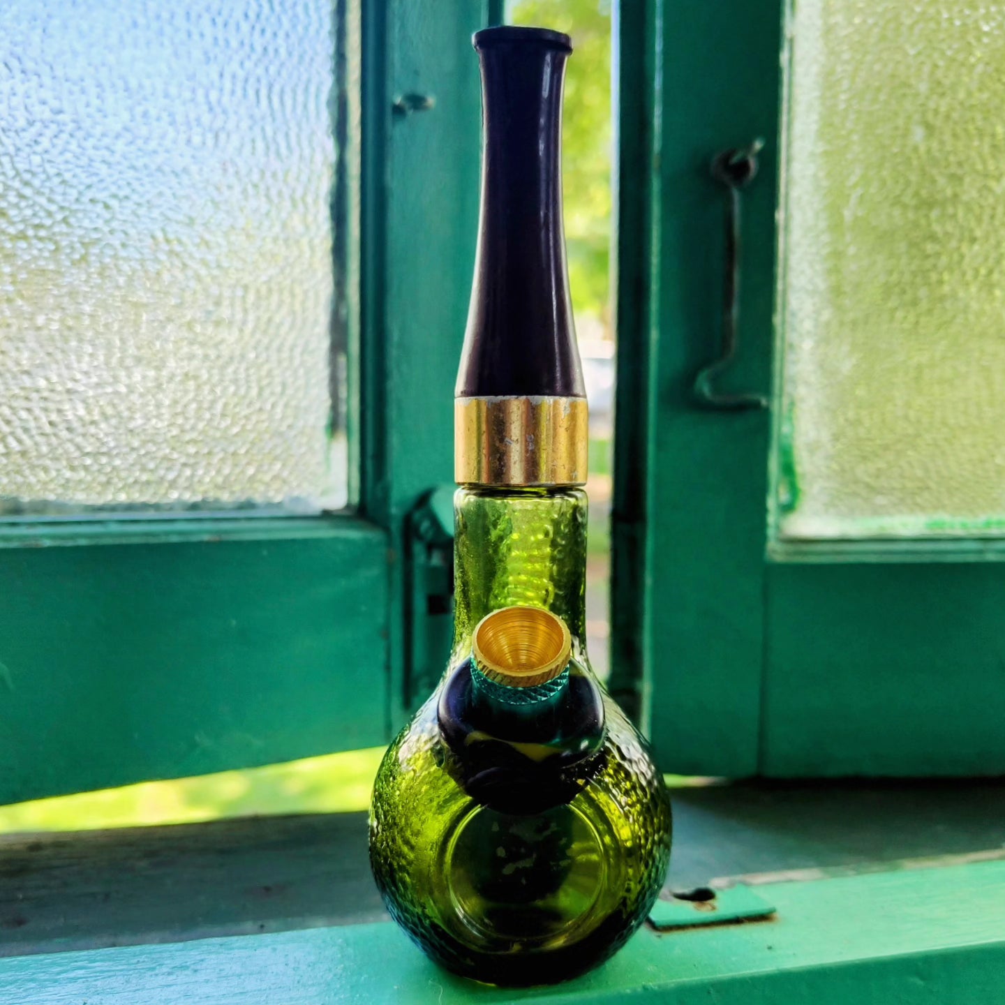 vintage avon green dimpled glass pipe shaped bong
