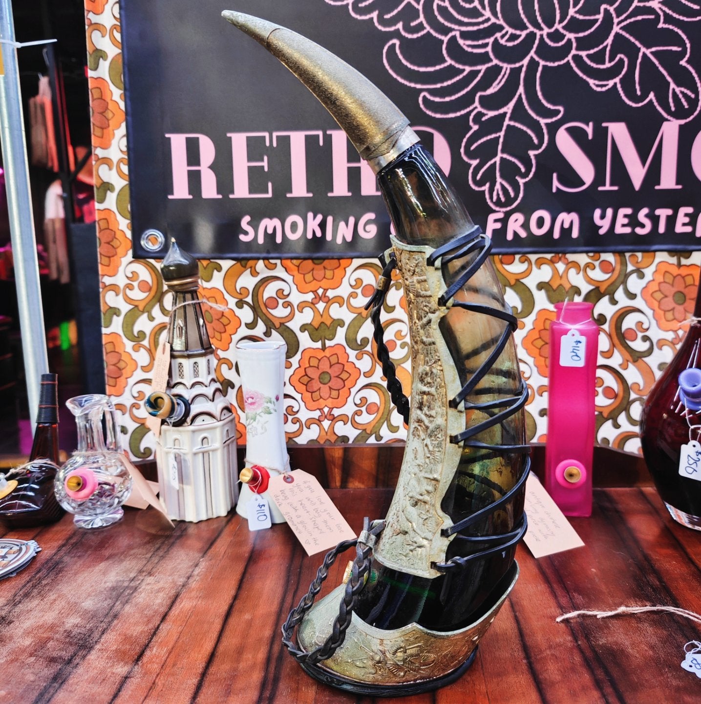 very old viking copper, green glass, and leather horn bong