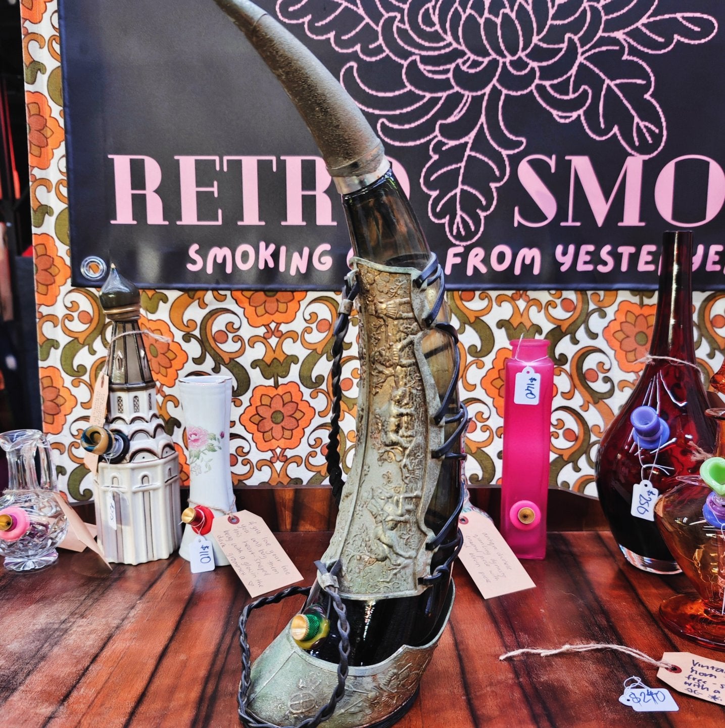 very old viking copper, green glass, and leather horn bong