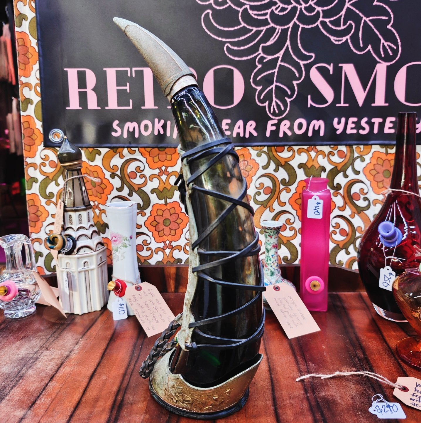 very old viking copper, green glass, and leather horn bong