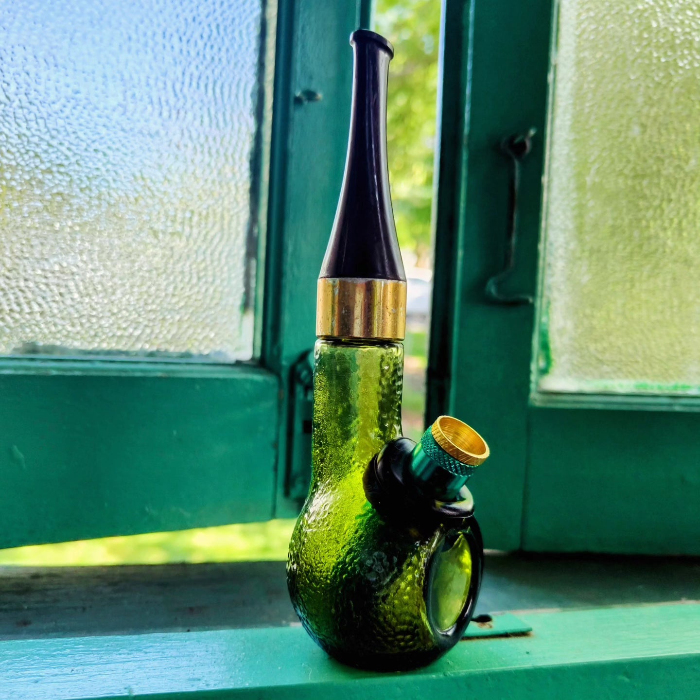 vintage avon green dimpled glass pipe shaped bong