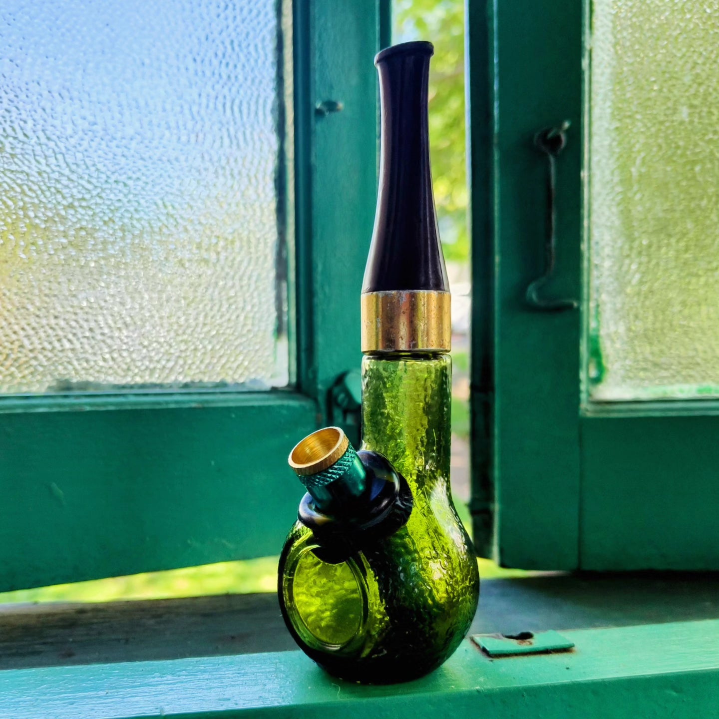 vintage avon green dimpled glass pipe shaped bong