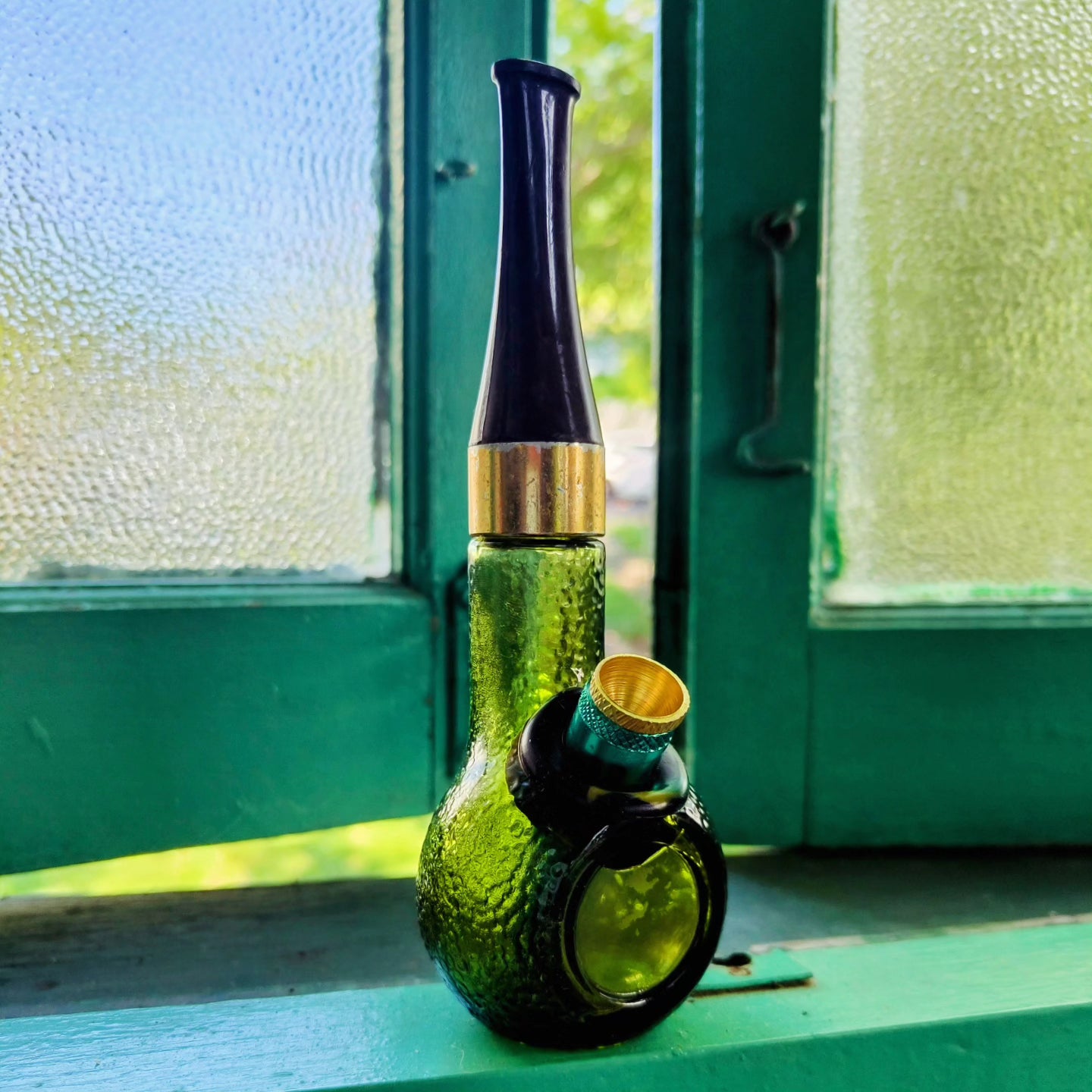 vintage avon green dimpled glass pipe shaped bong