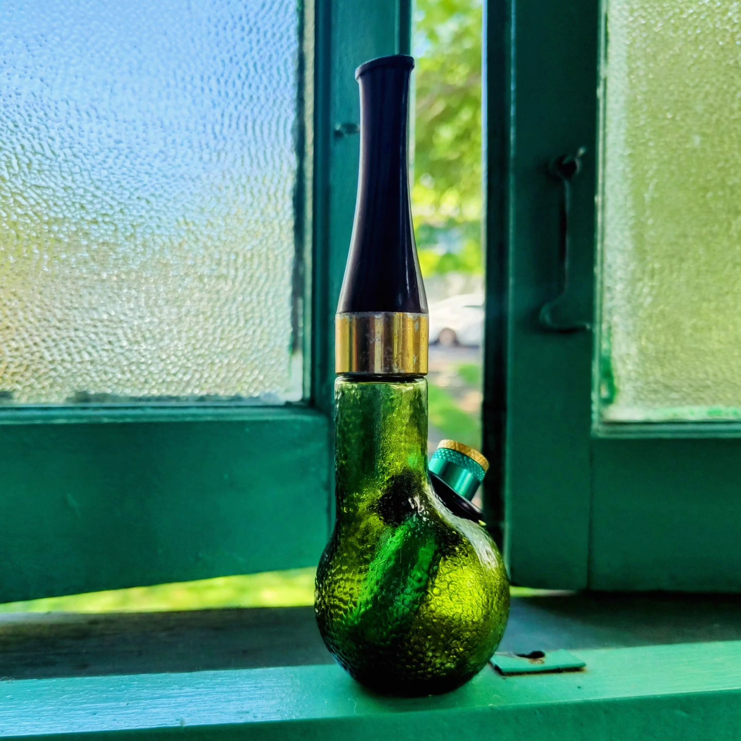 vintage avon green dimpled glass pipe shaped bong