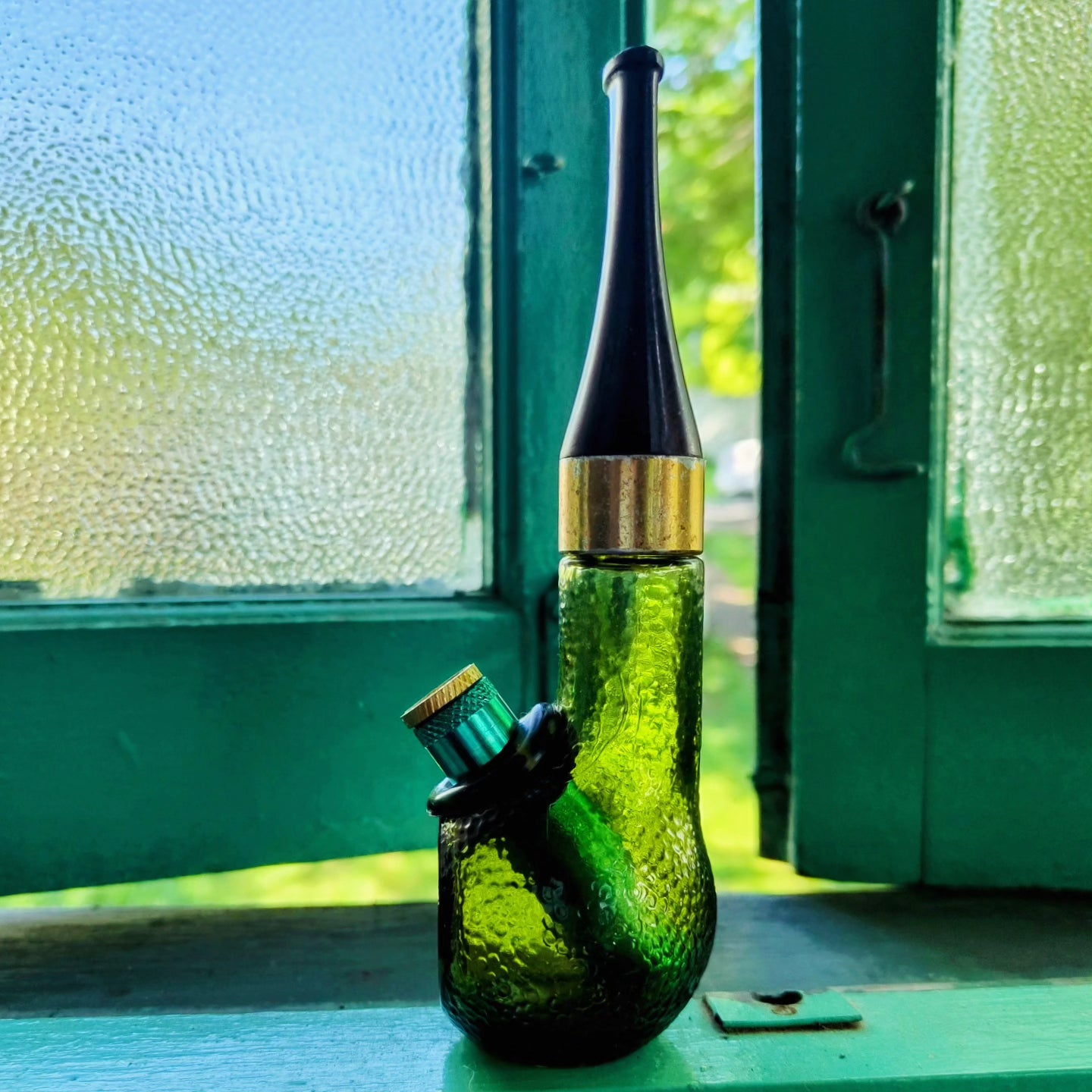 vintage avon green dimpled glass pipe shaped bong