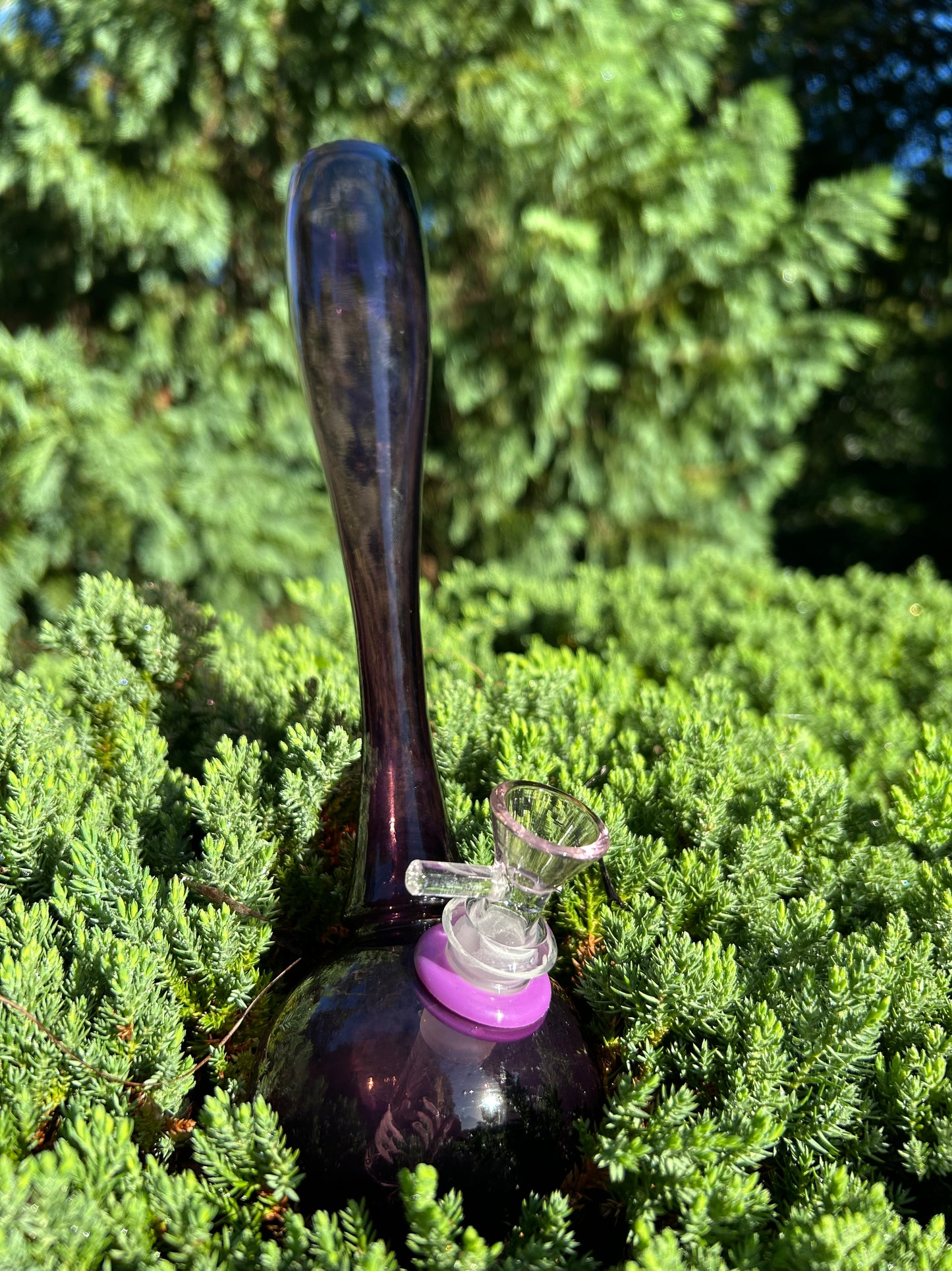 purple hand-blown glass vase, featuring a murano style