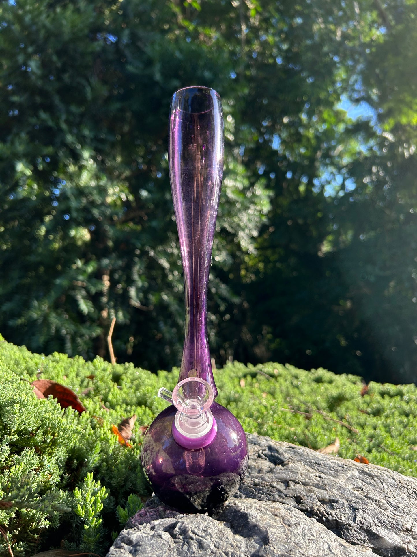 purple hand-blown glass vase, featuring a murano style