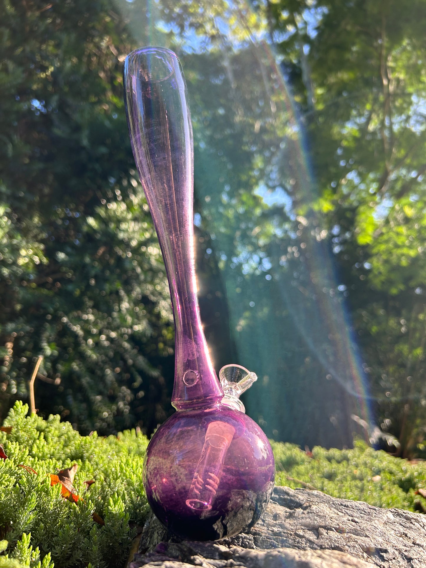 purple hand-blown glass vase, featuring a murano style