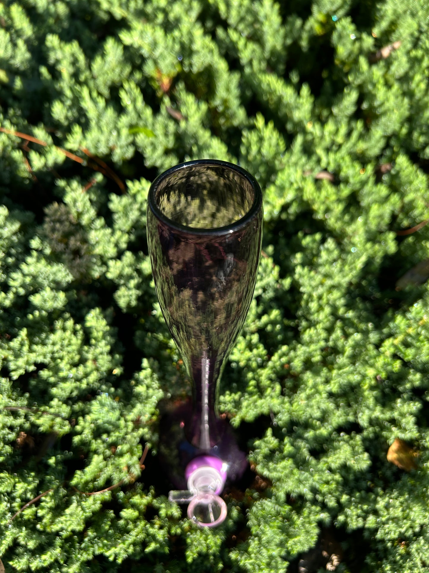 purple hand-blown glass vase, featuring a murano style
