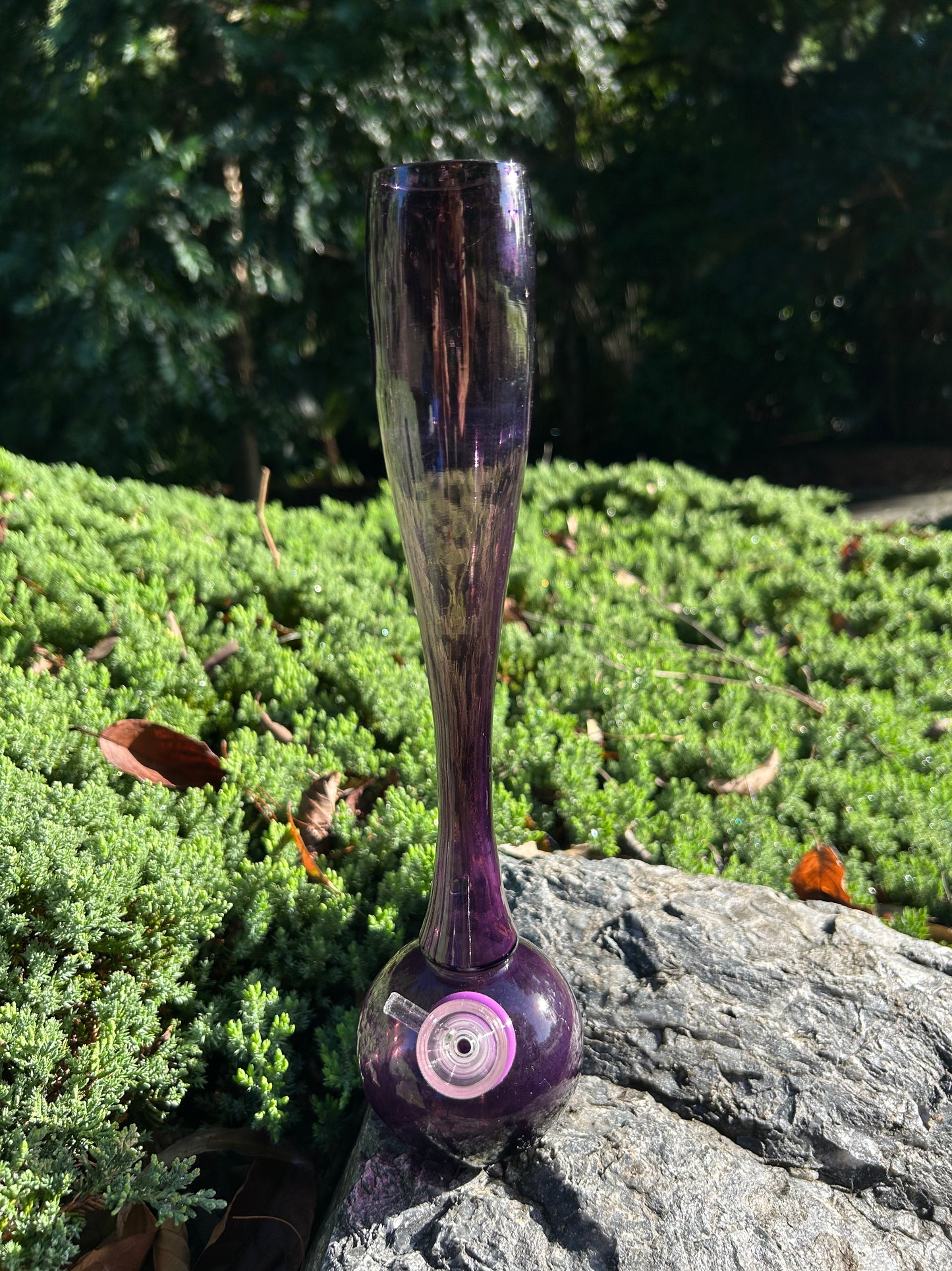 purple hand-blown glass vase, featuring a murano style
