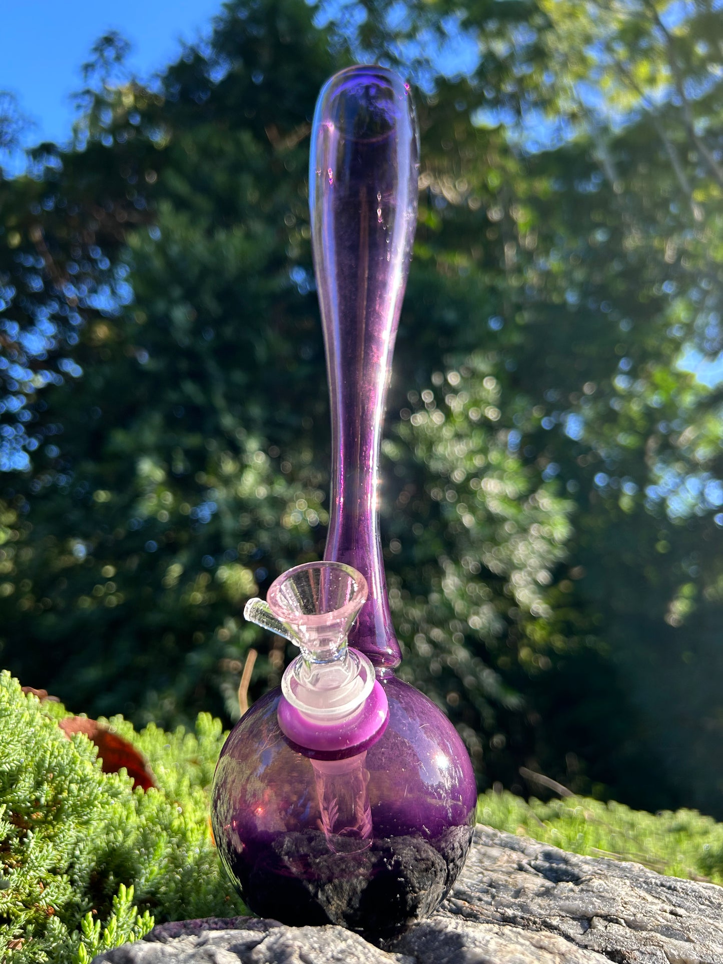 purple hand-blown glass vase, featuring a murano style