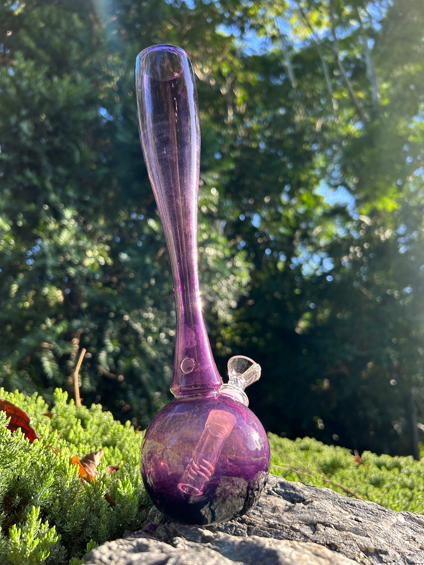 purple hand-blown glass vase, featuring a murano style