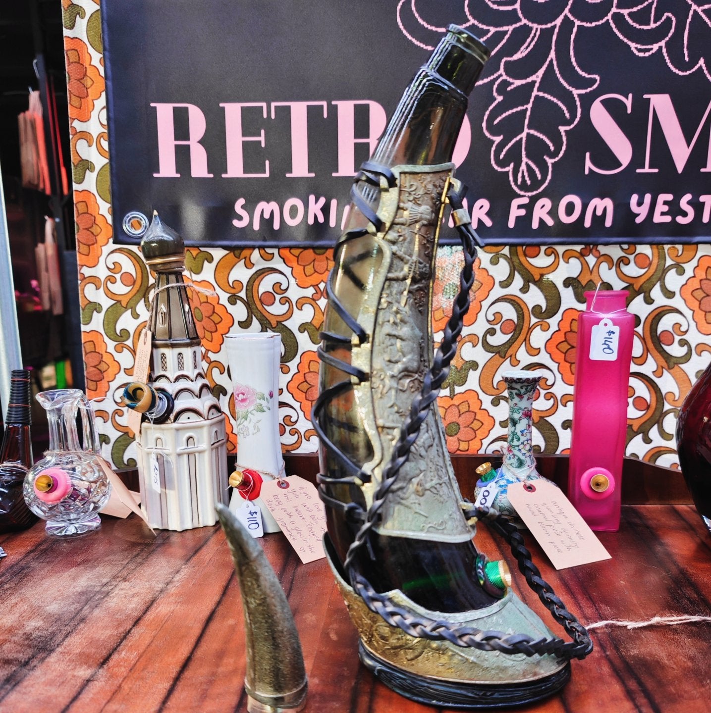 very old viking copper, green glass, and leather horn bong