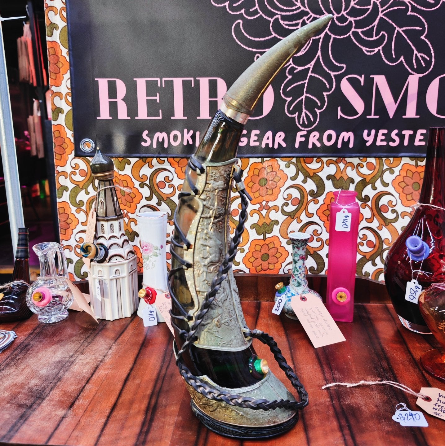 very old viking copper, green glass, and leather horn bong